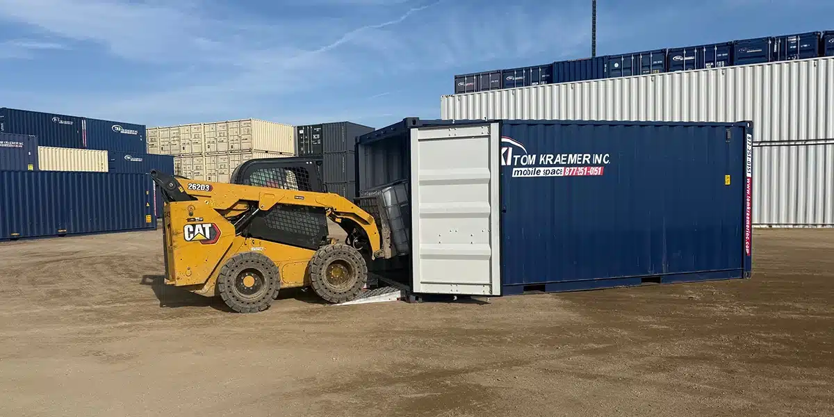 Skid Loader Driving into Storage Unit