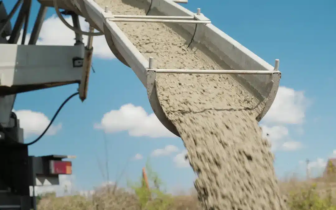Concrete truck chute with concrete pouring out chute